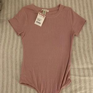Pink body suit